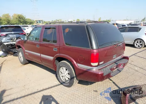 2000 GMC Jimmy Sle z USA, uszkodzony, nr VIN 1GKDT13W7Y2364600
